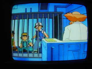 Ash and the gang got caught by Prof. Nanba.